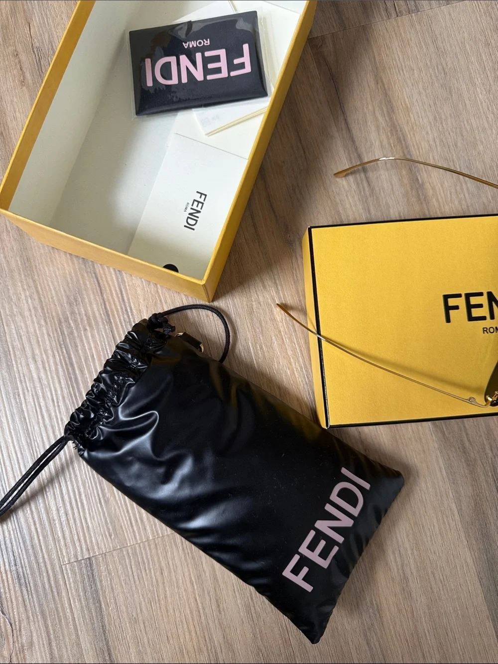 Fendi Slim Oval Sunglasses in Dark Brown and Gold